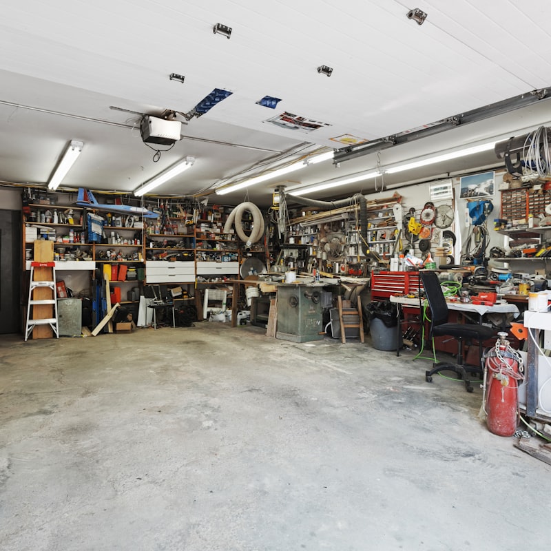 Cluttered garage before clearance